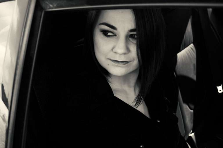 Budapest photographer for tourists captures woman in car