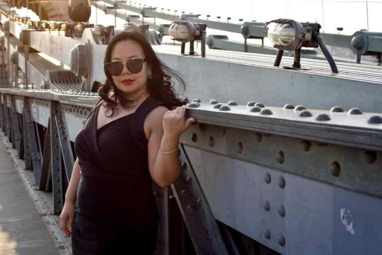 Solo traveller captured by Budapest photographer for tourists on Chain Bridge