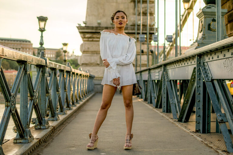 Budapest photographer for tourists captures woman on Chain Bridge