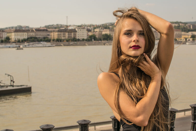 Budapest photographer for tourists captures woman and Danube