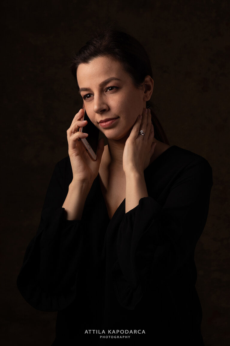 Woman talking on phone portrait Budapest