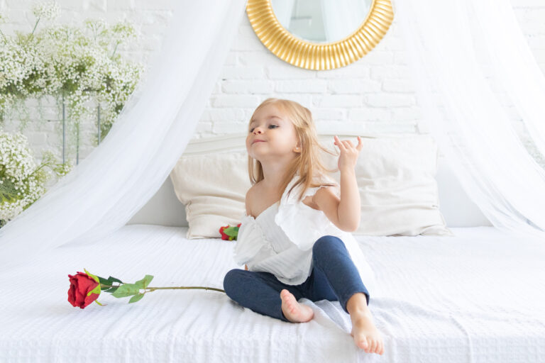 Budapest studio photography portraits little girl on bed