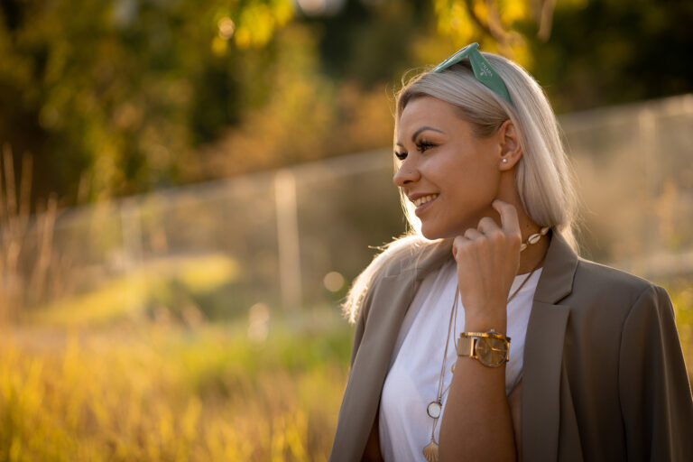 A young woman enjoys sunset in Budapest