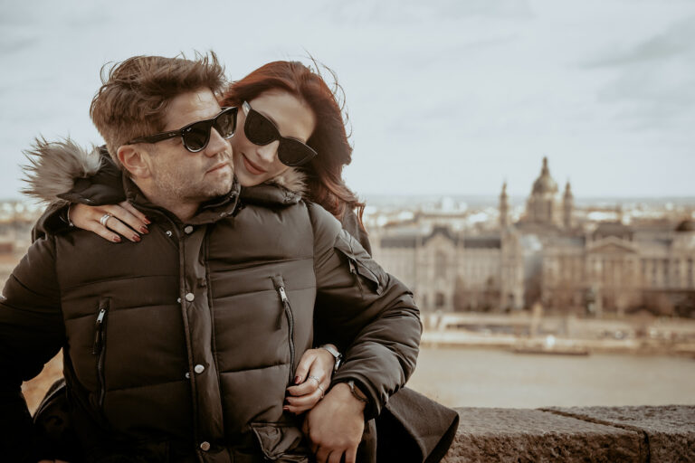 A tourist couple enjoys Budapest in their destination photography